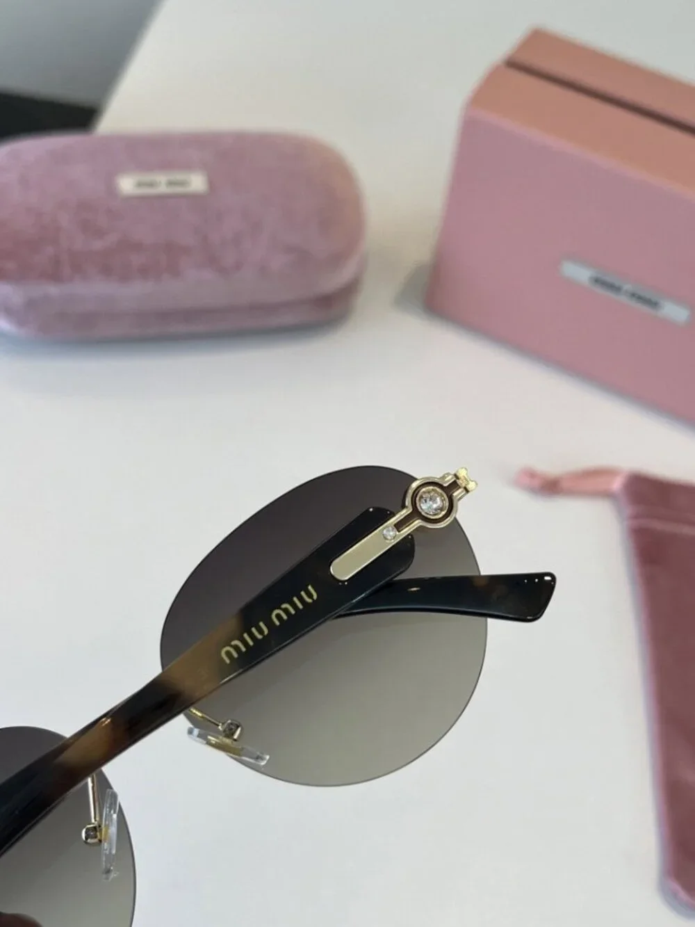🥰Miu Miu🥰 Round, Rimless Light Gray Sunglasses
